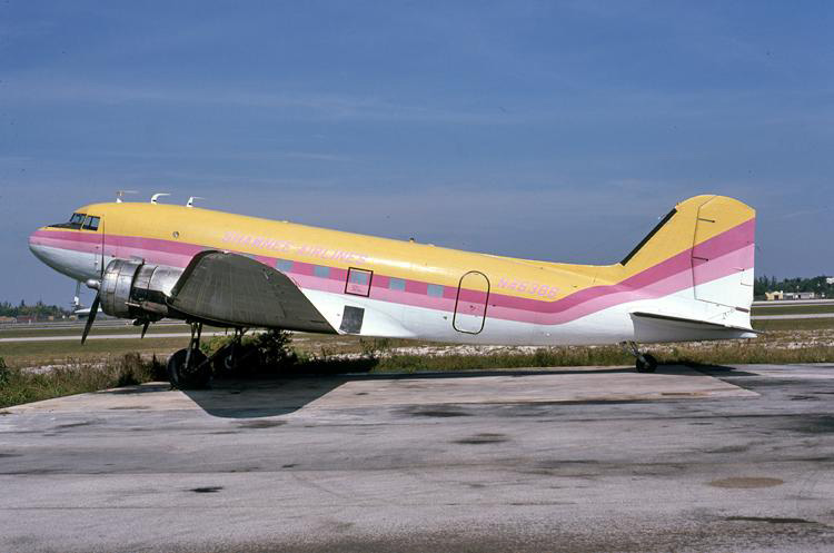 DC-3 N45366, seen at Sarasota in January 1977, sports yet another variation of the hot pink / yellow paint scheme.