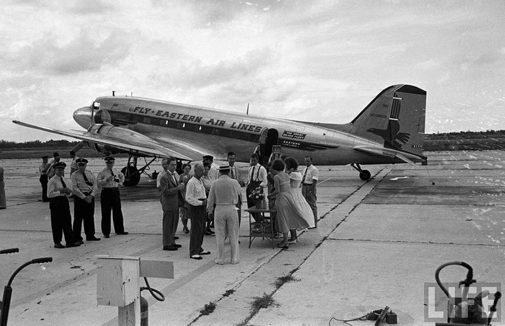 Loading luggage and freight onto NC19963. This particular aircraft was delivered to Eastern in 1940 and was one of the few DC-3s not pressed into wartime service.