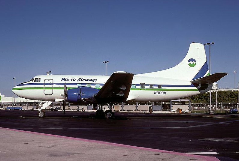 Martin 404 N969M pictured at Miami in 1984, with shortened Marco Airways titles and Air Florida colors.