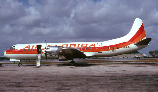 Lockheed Electra N138US (msn 1144) at Miami in 1974. This aircraft formerly flew with Northwest and was later re-registered N24AF.