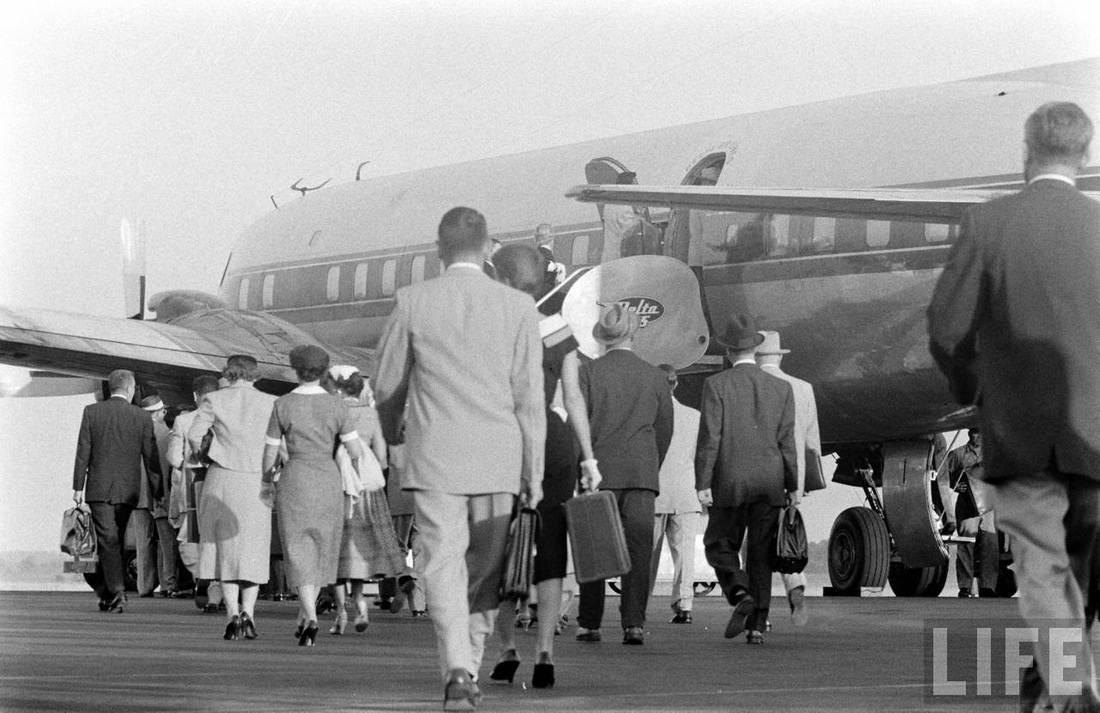 Passengers boarding a Delta Airlines Douglas DC-7.