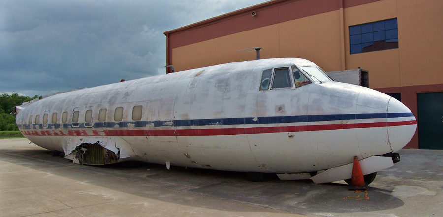 The faded colors of Provincetown-Boston Airline still adorn the weathered fuselage of Martin 404 N40415 (msn 14119) behind the Fantasy of Flight museum near Polk City, Florida.