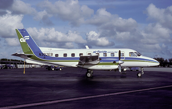 Finair operated Embraer Bandeirantes and Piper Navajos in Air Florida colors. N302EB is pictured at Miami.