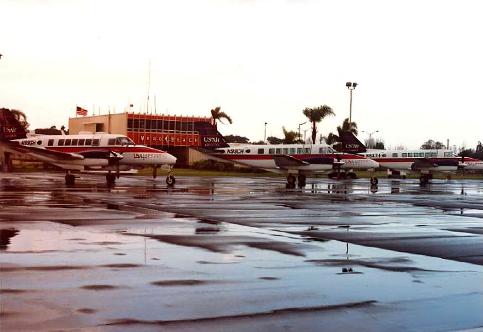 Chautauqua's Beech 99s, in USAir Express colors, pictured at Vero Beach, Florida, circa 1989-90. 