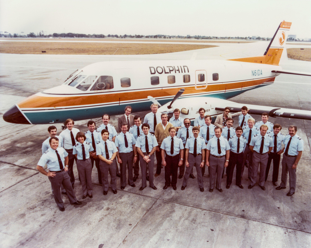 Dolphin Airways pilots with Embraer Bandeirante turboprop aircraft.